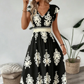 Candela - Vestido maxi barroco con escote en V