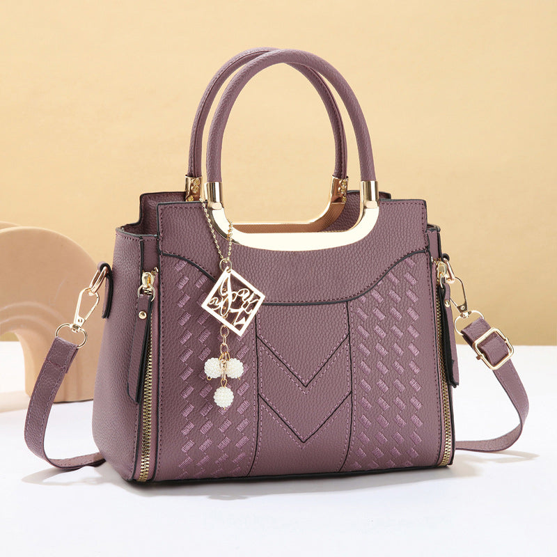 Heidi | Bolso de mano para mujer con costura en V – herrajes dorados, múltiples compartimentos y asa de mano