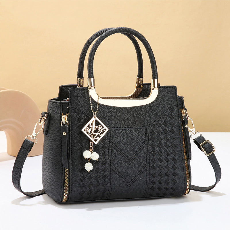 Heidi | Bolso de mano para mujer con costura en V – herrajes dorados, múltiples compartimentos y asa de mano