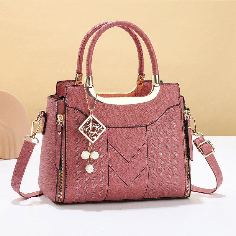 Heidi | Bolso de mano para mujer con costura en V – herrajes dorados, múltiples compartimentos y asa de mano