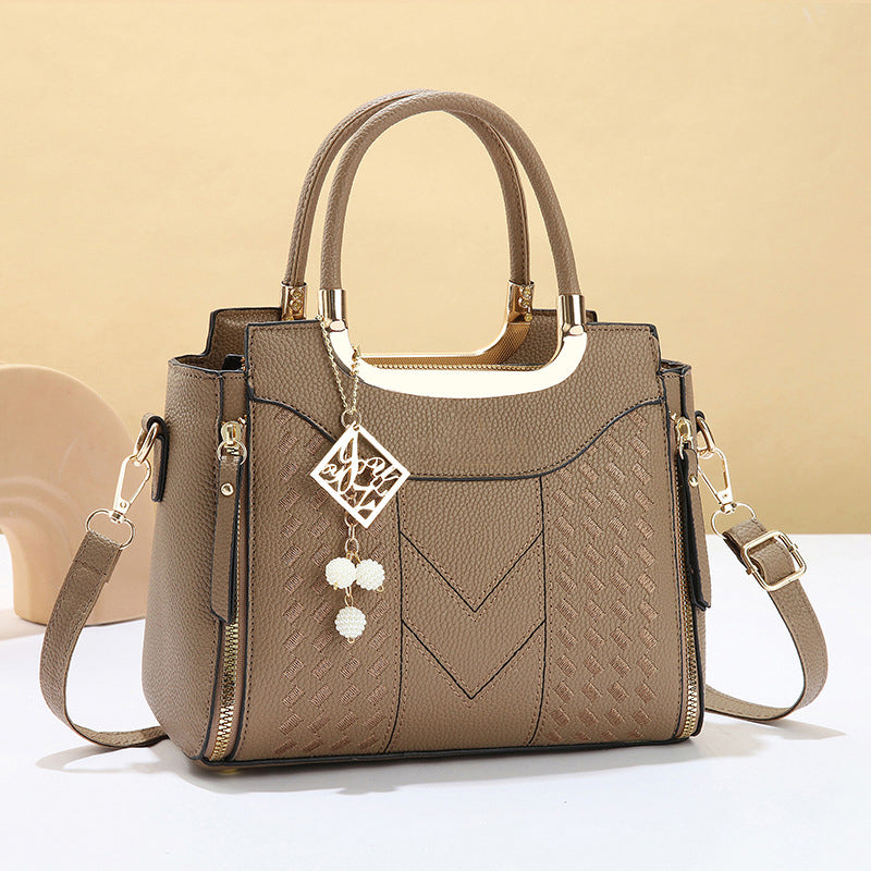 Heidi | Bolso de mano para mujer con costura en V – herrajes dorados, múltiples compartimentos y asa de mano