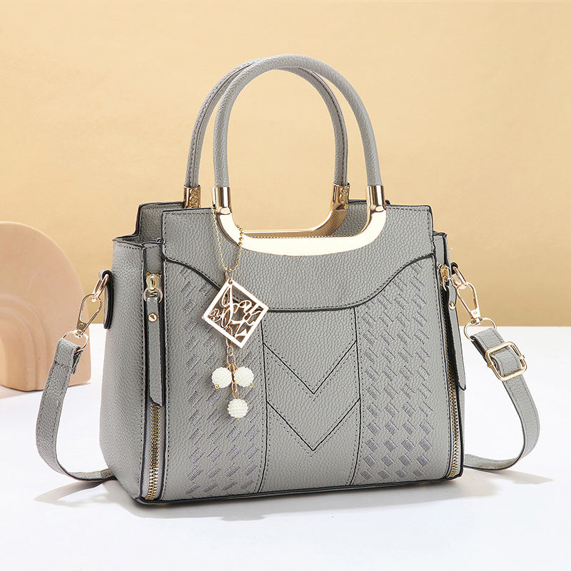 Heidi | Bolso de mano para mujer con costura en V – herrajes dorados, múltiples compartimentos y asa de mano