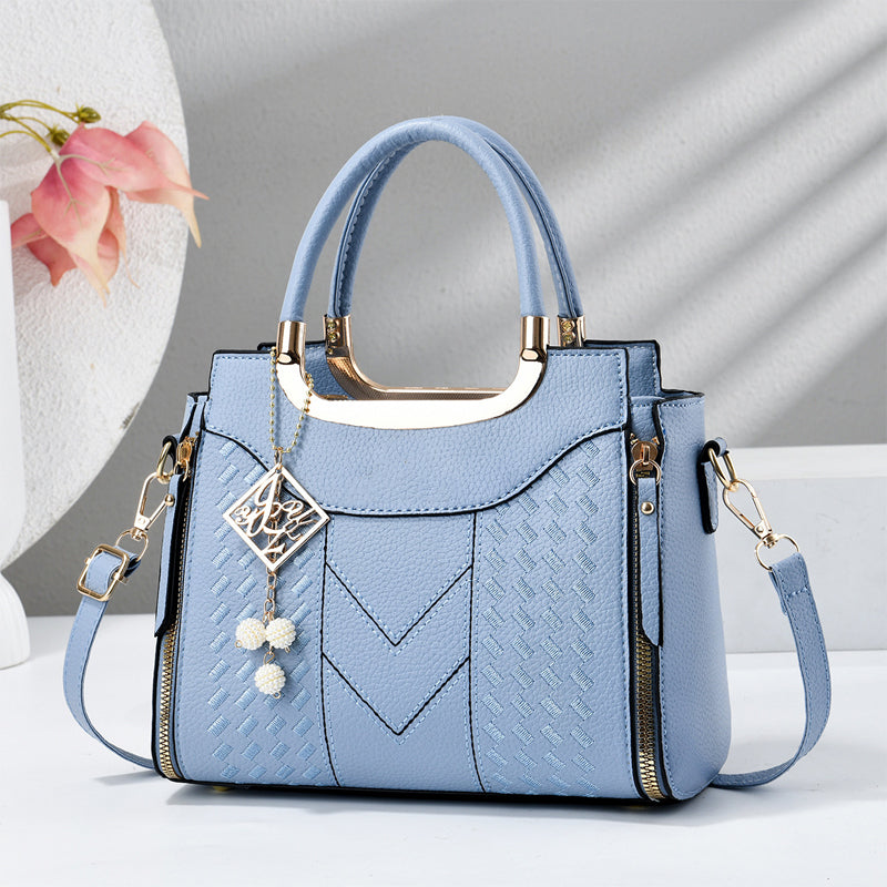 Heidi | Bolso de mano para mujer con costura en V – herrajes dorados, múltiples compartimentos y asa de mano