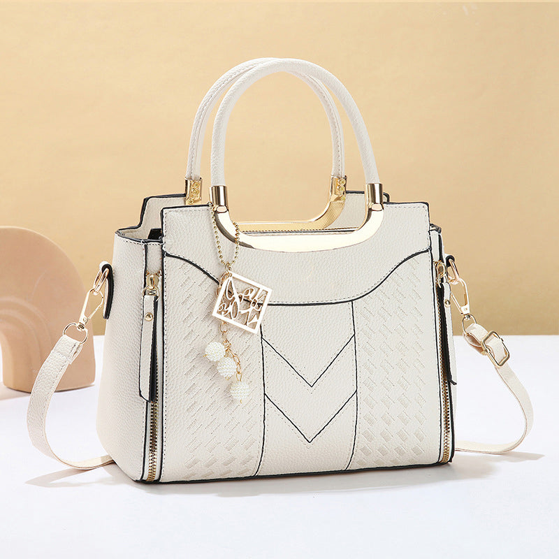 Heidi | Bolso de mano para mujer con costura en V – herrajes dorados, múltiples compartimentos y asa de mano